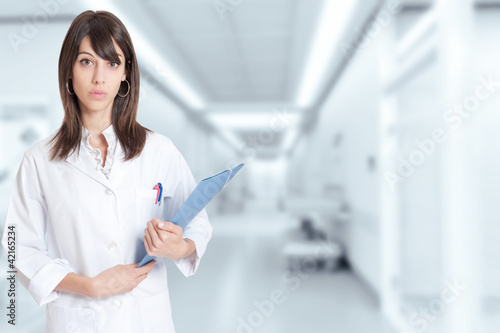 Photo: Female young healthcare professional at the hospital Female young healthcare professional at the hospital