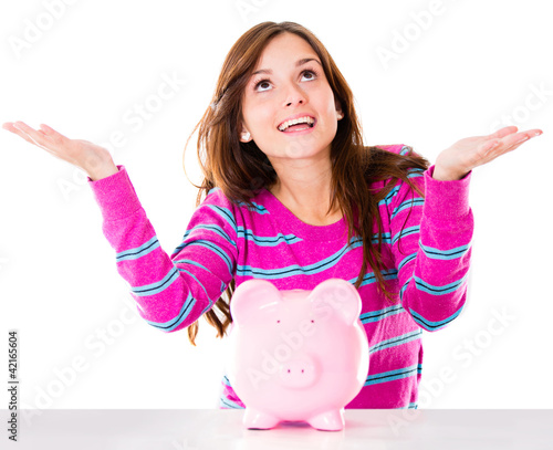 Photo: Woman with a piggybank Woman with a piggybank