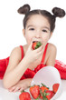 Little girl with strawberry on white background