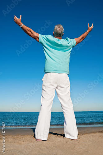Photo: Grateful man with open arms Grateful man with open arms