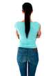 Beautiful young woman looking at wall. Rear view