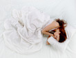 Photo: woman sleeping on the bed woman sleeping on the bed