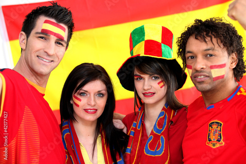 Photo: Group of soccer fans backing the Spanish team Group of soccer fans backing the Spanish team