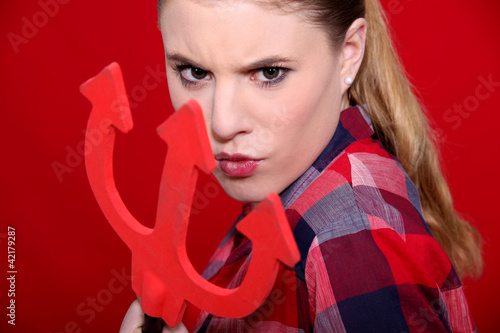 Photo: woman dressed as a devil woman dressed as a devil