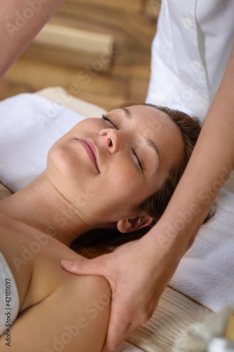 Photo: Woman neck massage at luxury spa Woman neck massage at luxury spa