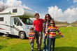 Family vacation in camping, camper (RV) holiday trip with kids