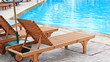 Chair beside the pool.