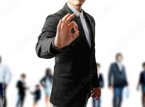 Photo: Business man's hand make OK isolated Business man's hand make OK isolated
