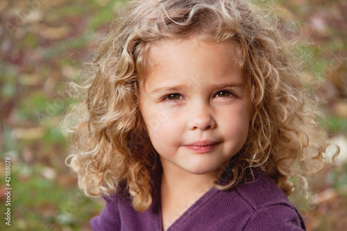 Photo: little girl with beautiful blonde curls little girl with beautiful blonde curls