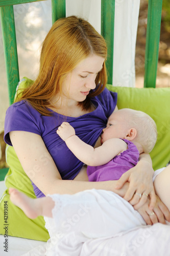 Photo: Mother breastfeeding her baby Mother breastfeeding her baby