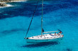 Sailing boat at anchor. Paradise wild bay. Cala Marmolis.