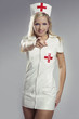 Very sexy woman in kinky nurse outfit