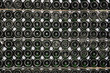 Racks with bottles in a dark wine cellar