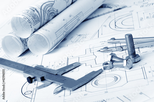 Photo: The plan industrial details, a screws, caliper, divider. A photo The plan industrial details, a screws, caliper, divider. A photo