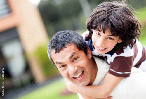 Photo: Father and son playing Father and son playing