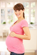 Pregnant woman at home