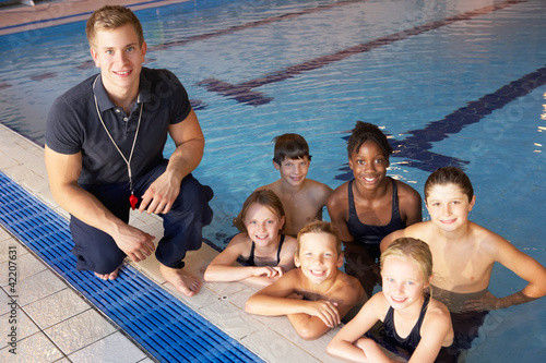 Photo: Children having swimming lesson Children having swimming lesson