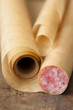 Smoked sausage wrapped in paper,shallow focus