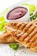 Grilled chicken breasts and vegetables