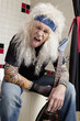 Portrait of guitarist sticking out tongue