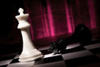 Photo: Composition from chessmen on a color background Composition from chessmen on a color background