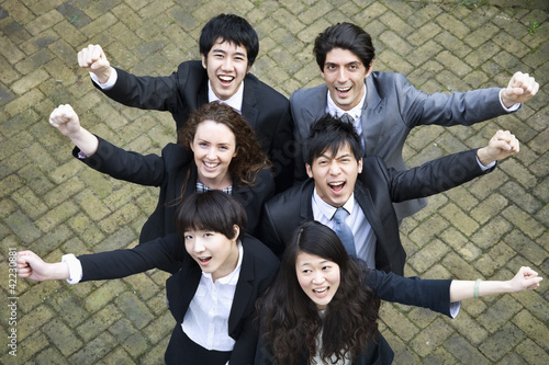 Photo: Successful multi ethnic business group Successful multi ethnic business group
