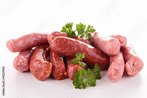 Foto: isolated raw sausages isolated raw sausages