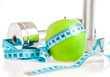 Photo: Dumbbells and apple. A healthy way of life Dumbbells and apple. A healthy way of life