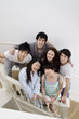 Young friends posing on stairway