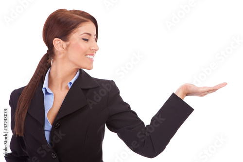 Photo: Business woman presenting something Business woman presenting something