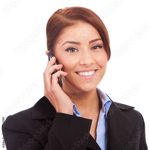 Foto: happy business woman speaking on phone happy business woman speaking on phone