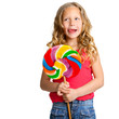 Portrait of cute girl with candy.
