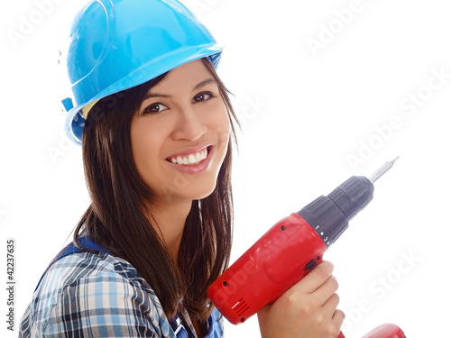 Foto: smiling girl with a drill smiling girl with a drill