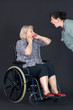Photo: Elder abuse senior woman being shouted at by nurse Elder abuse senior woman being shouted at by nurse