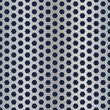 Seamless metal hexagon perforated texture.