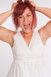 Shocked red haired girl