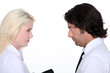 Man and woman competing for the same promotion