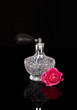 Luxurious perfume bottle atomizer with flower blossom