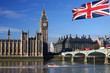 Big Ben with  city boat in London, UK