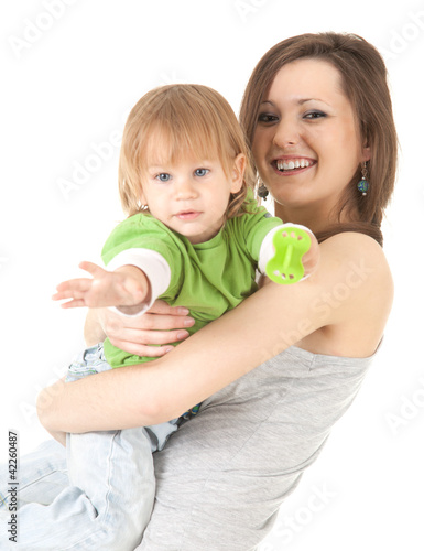 Foto: young mother cuddling baby son, white background young mother cuddling baby son, white background
