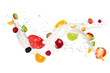 Fruit mix in milk splash, isolated on white background