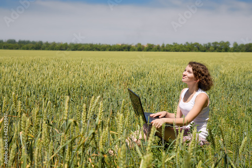 Photo: Woman in a field Woman in a field