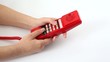 Video: Woman is pressing the buttons of old red telephone Woman is pressing the buttons of old red telephone