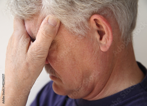 Photo: older man depressed or grieving older man depressed or grieving