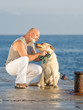 Man of middle age with dog
