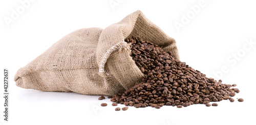 Photo: Burlap sack full of coffee beans isolated on white Burlap sack full of coffee beans isolated on white