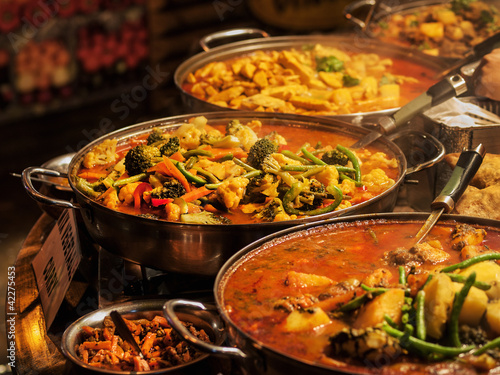 Photo: Vegetable curry - Indian takeaway at a London's market Vegetable curry - Indian takeaway at a London's market
