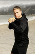 Photo: Young athlete boxer at beach Young athlete boxer at beach