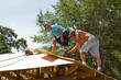 Carpenters Nailing Plywood