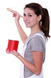 Brunette with red can